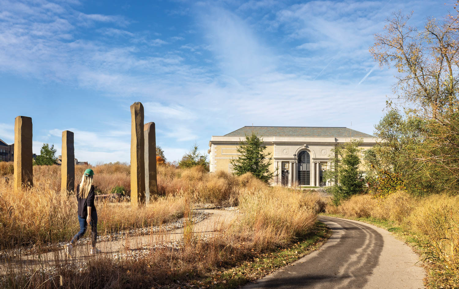 exterior of the building surrounded by golden wheat fields