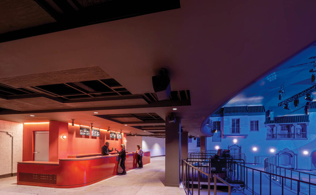 Bright orange bar on the ground floor facing the hall.