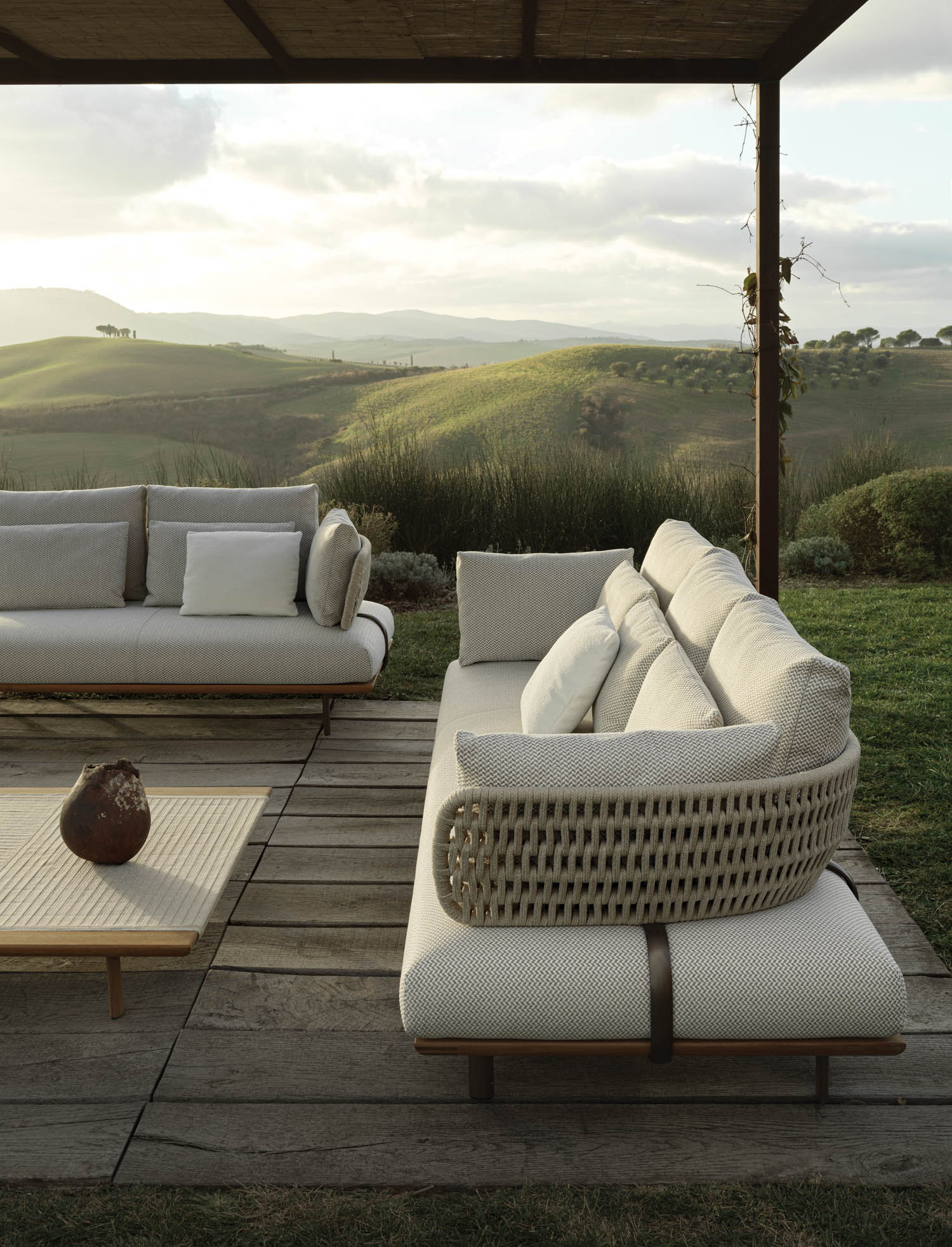 Molteni outdoor couches under a canopy