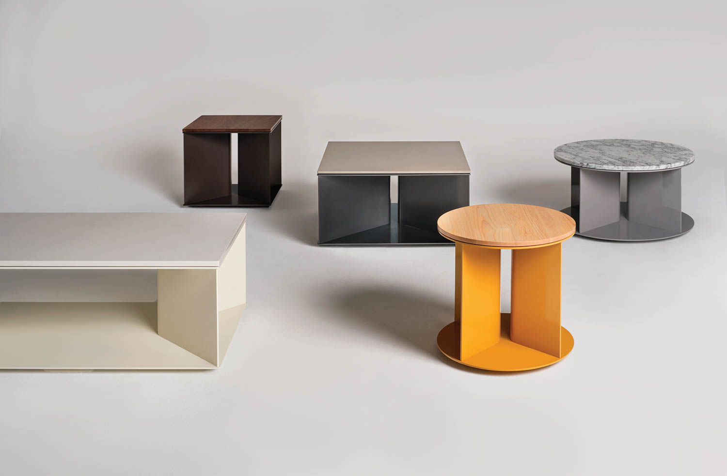 multiple colored side tables on display