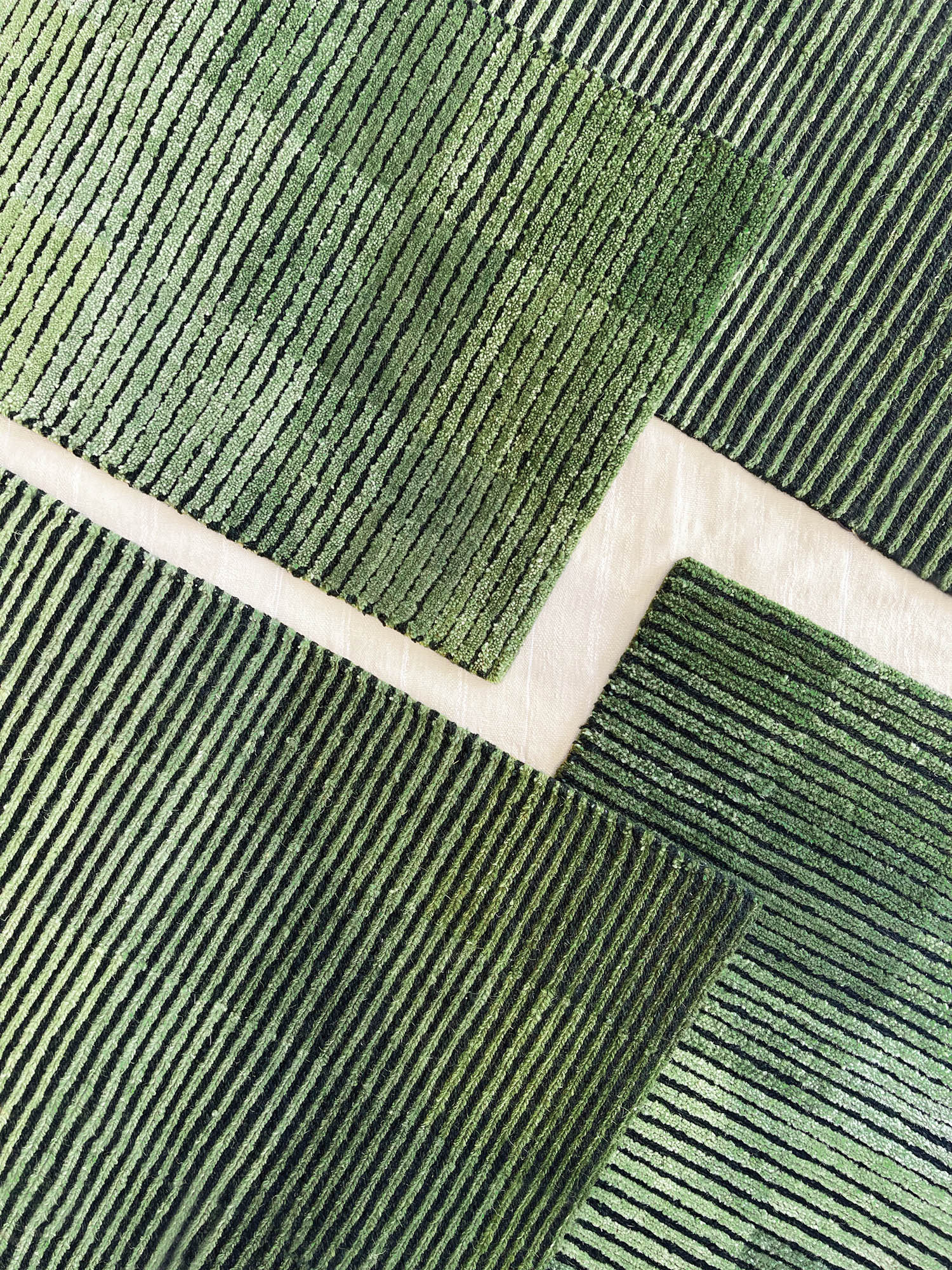 rug with green stripes and one large white stripe