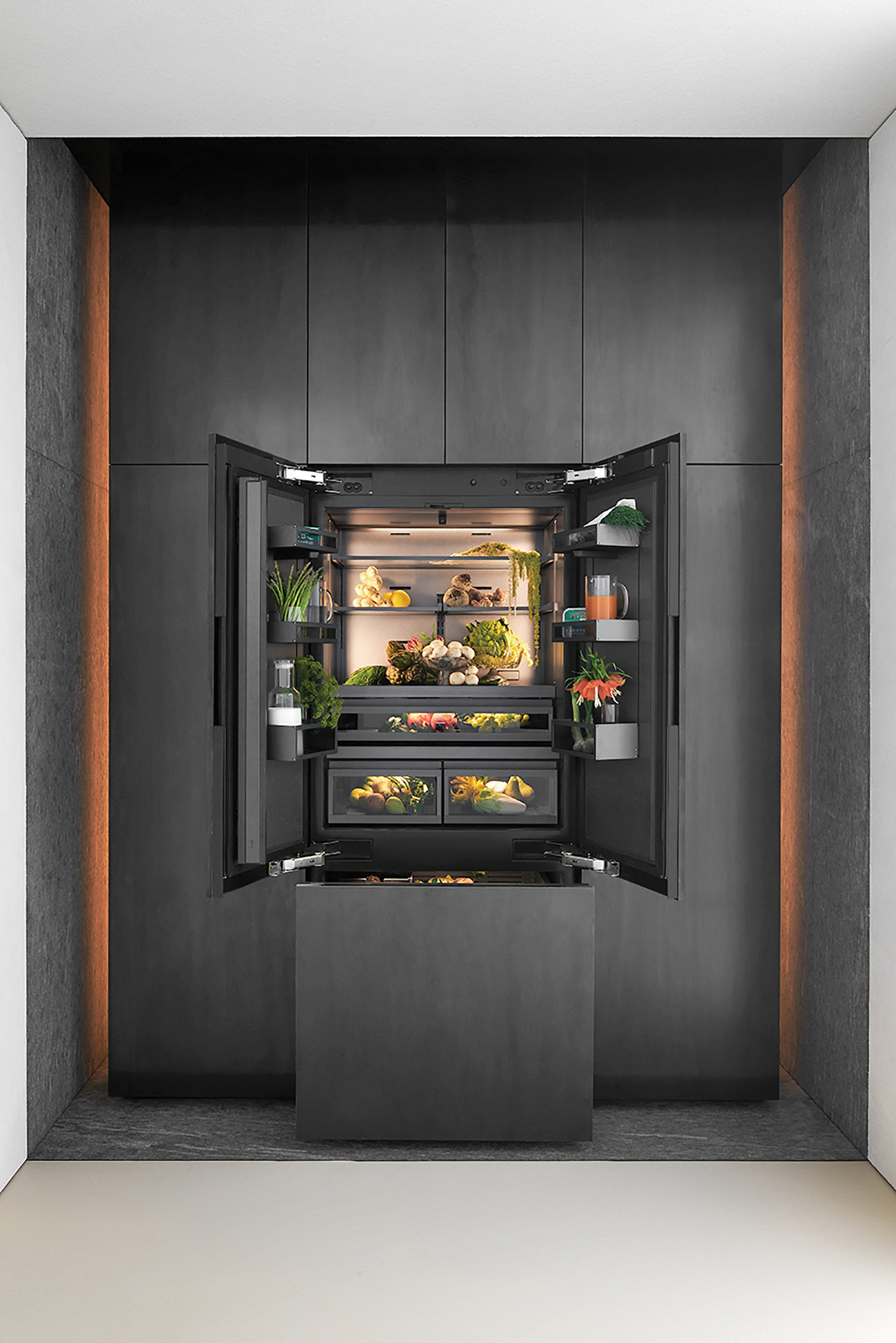 a black refrigerator with a door open