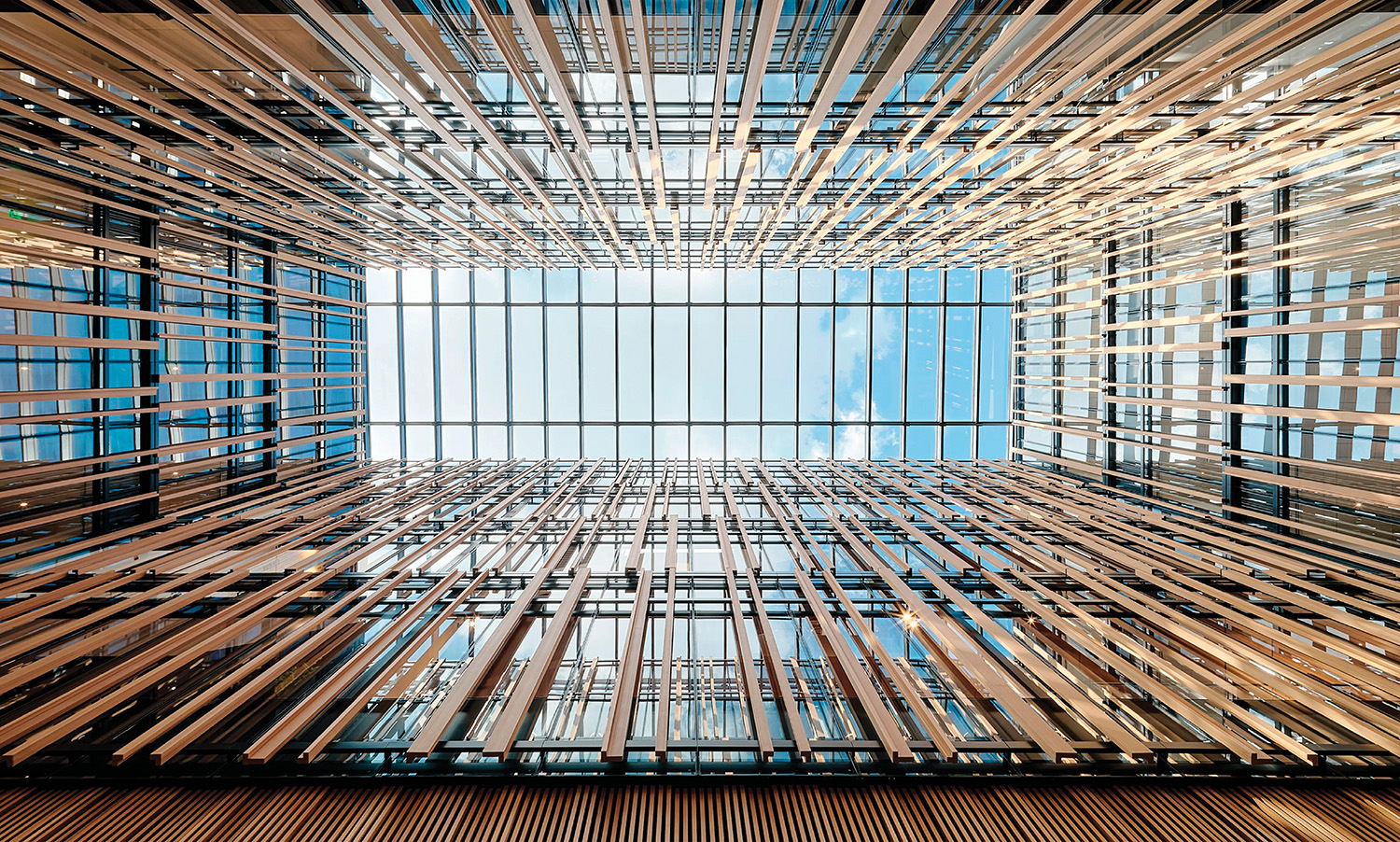 A large glass window with wooden slats