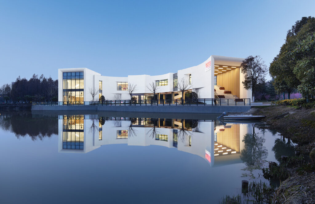 A building with a reflection in the water