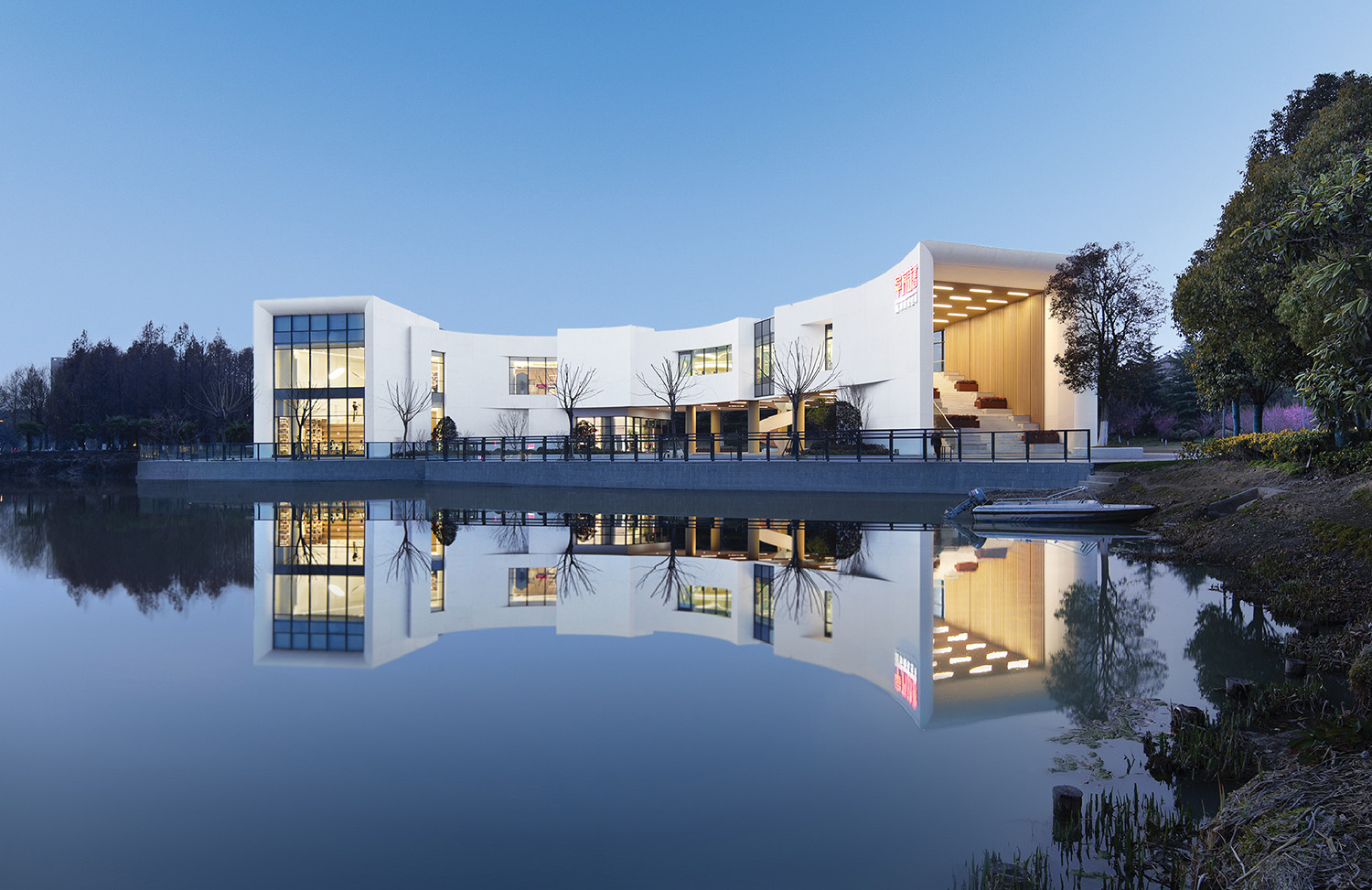 A building with a reflection in the water