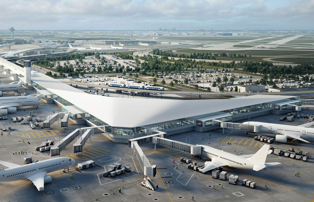 A large airport with many planes parked on the tar