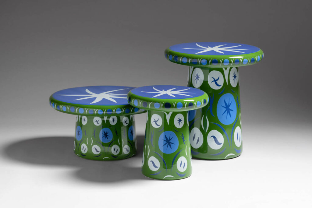 colorful tables painted with blue tabletop and green base