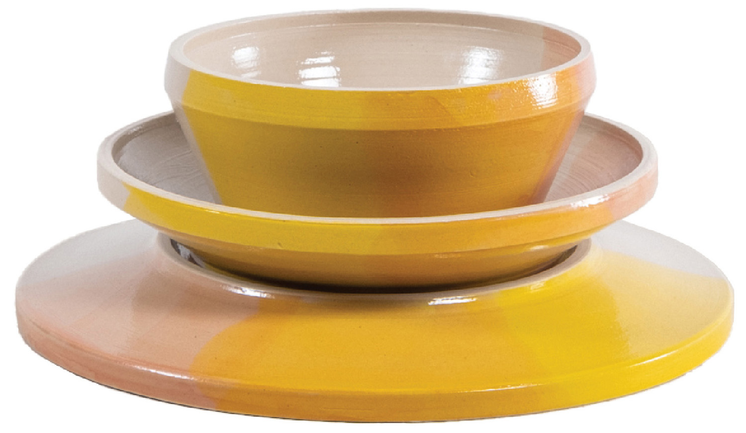 A yellow and white bowl with two bowls