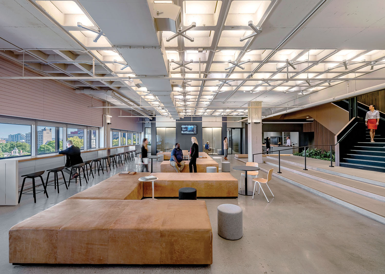 A large open space with a long table and chairs