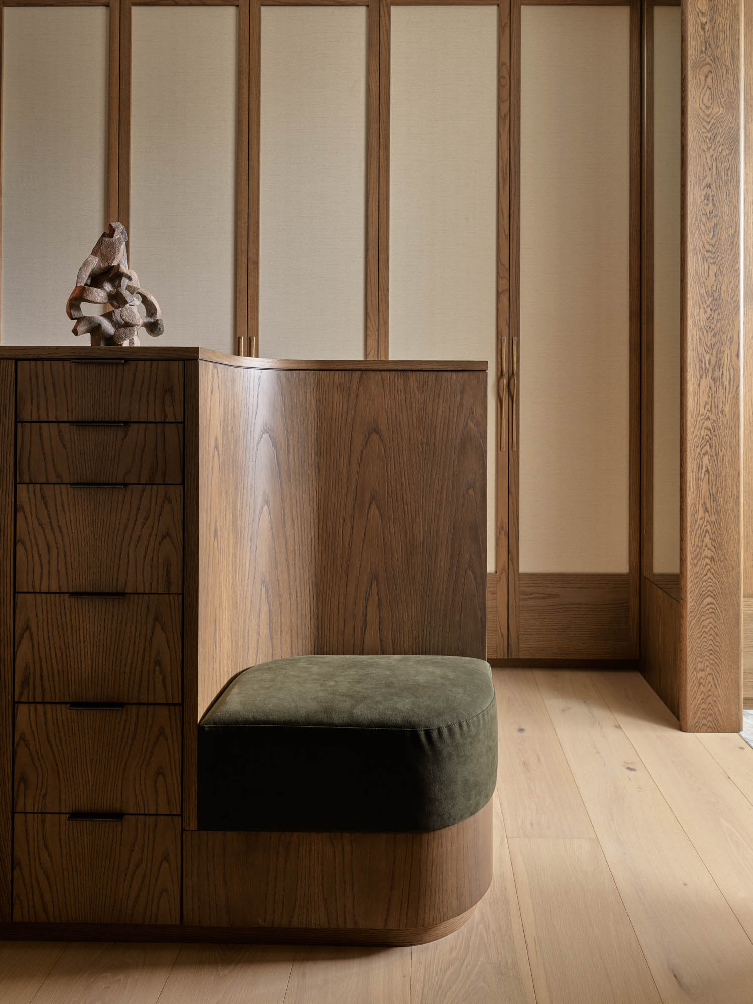 suite area outside of bathroom with wooden chair