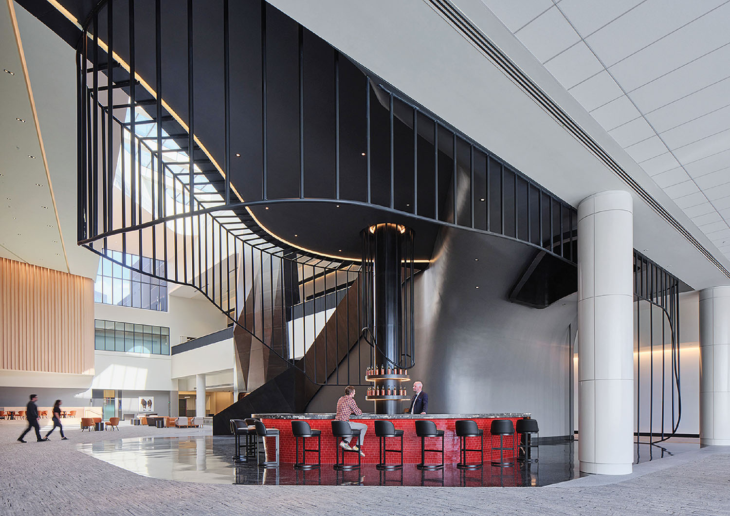 A large lobby with a spiral staircase