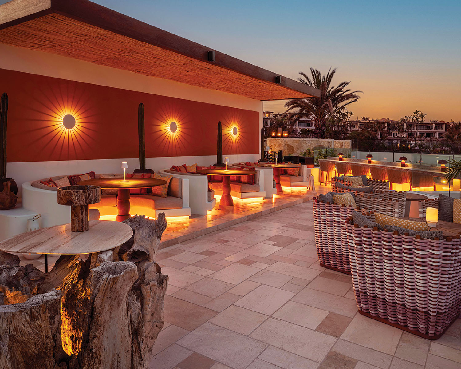 A patio with a fire pit and a fire pit