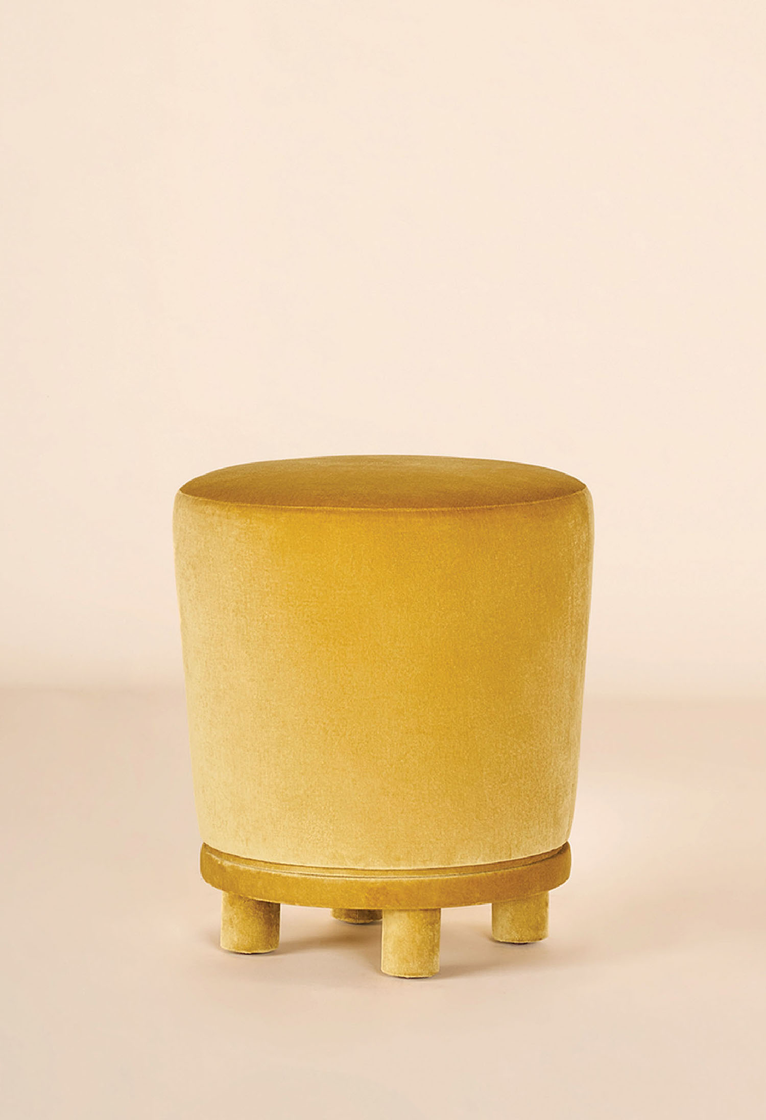 A yellow planter with a wooden base