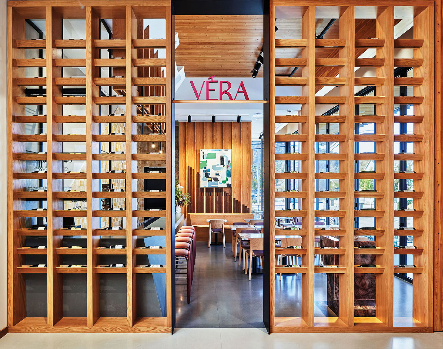 A wooden door with a glass door opening