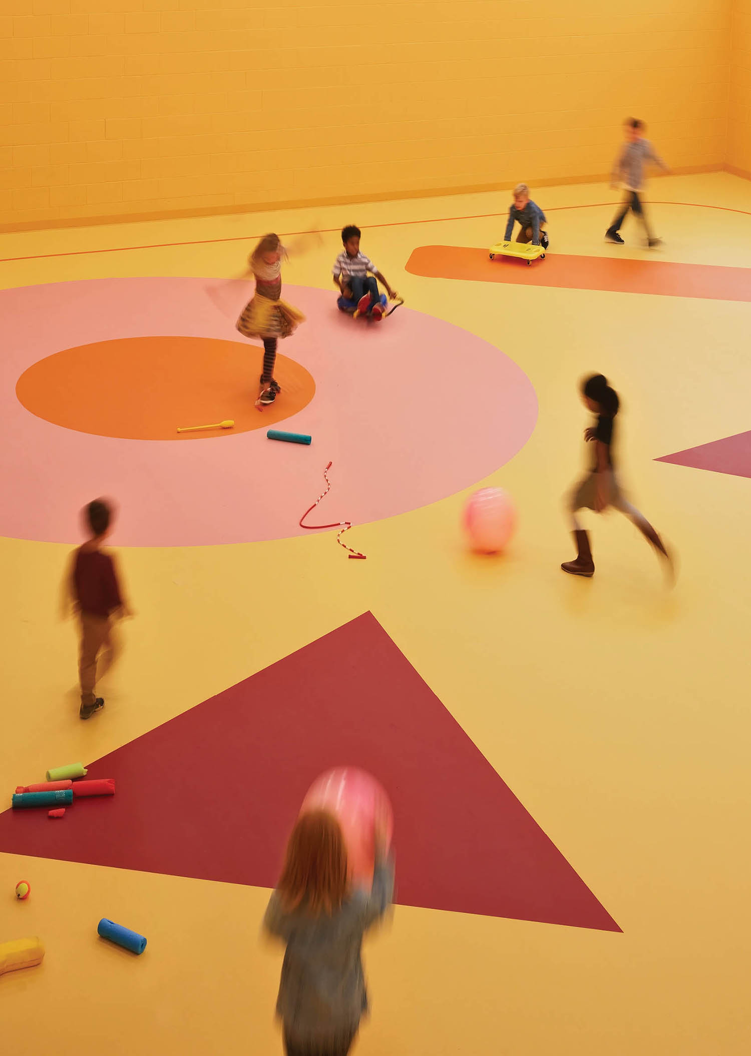 A group of children playing in a room