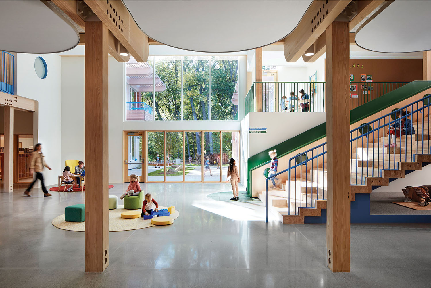 A large open space with a staircase and a play area