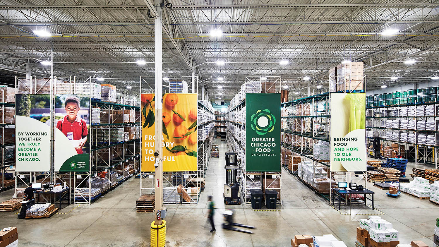 A large warehouse with lots of boxes and signs