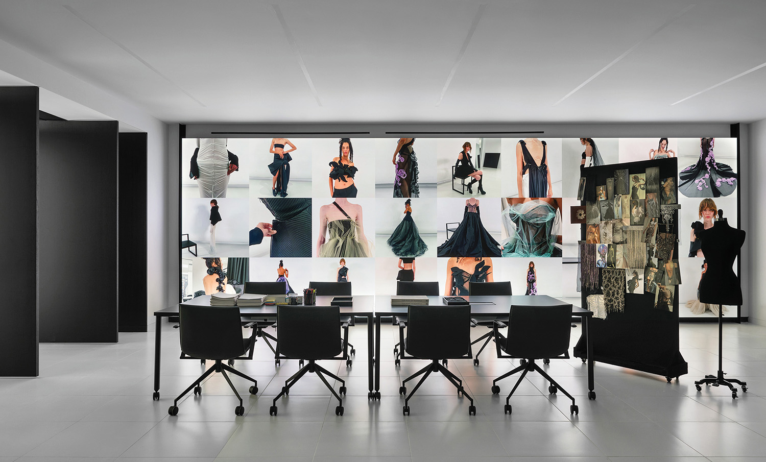 A room with a large display of clothes.
