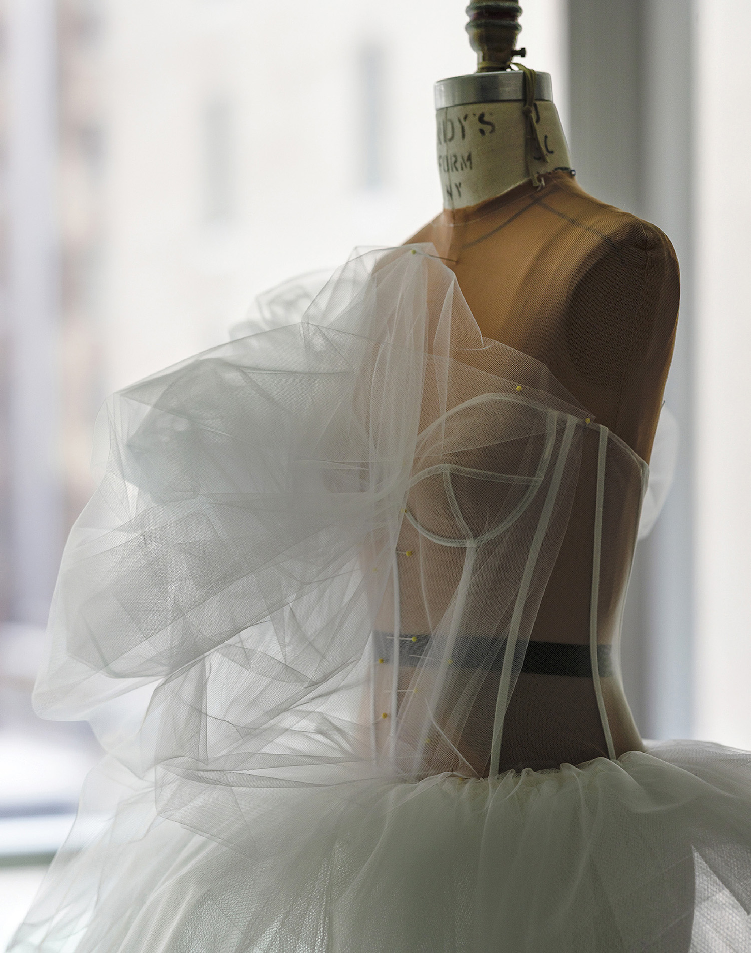 A mannequin with a dress on it.
