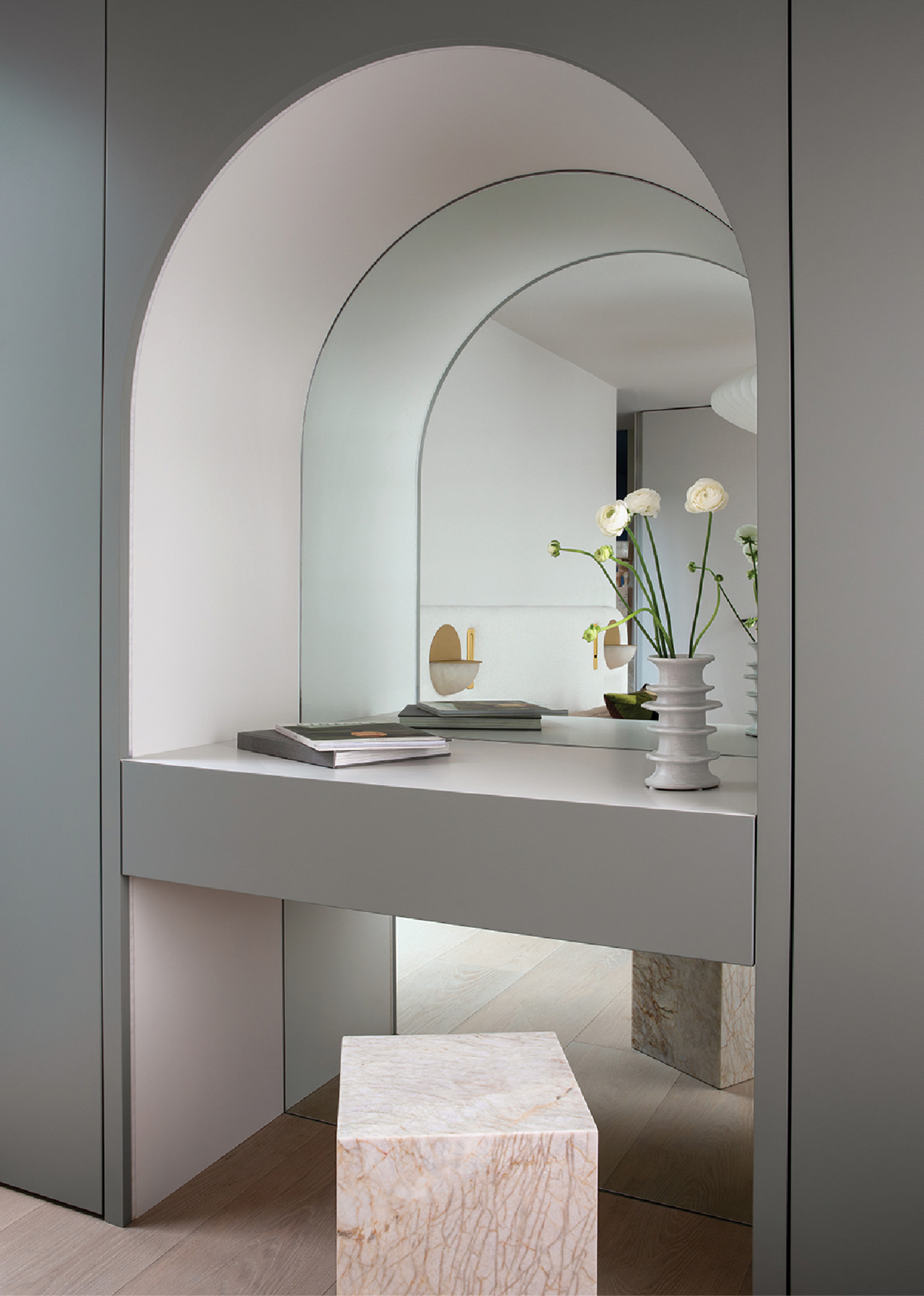 built in vanity with stone plinth and mirror