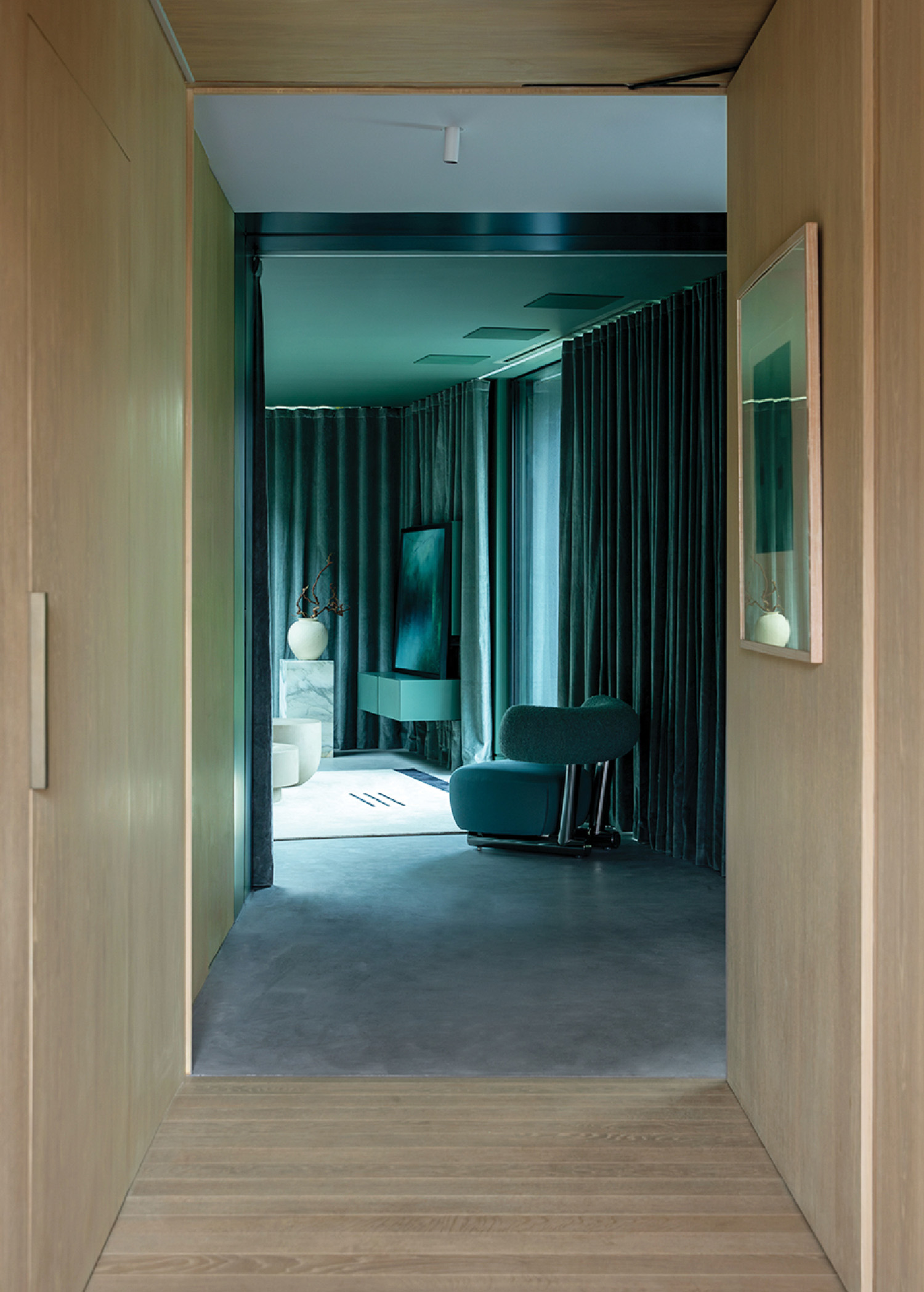 A room with a bed and a chair.