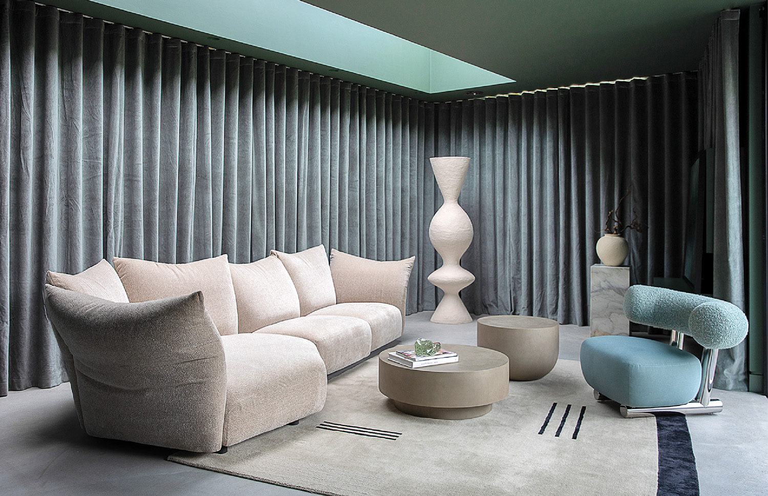 A living room with a couch and a chair.