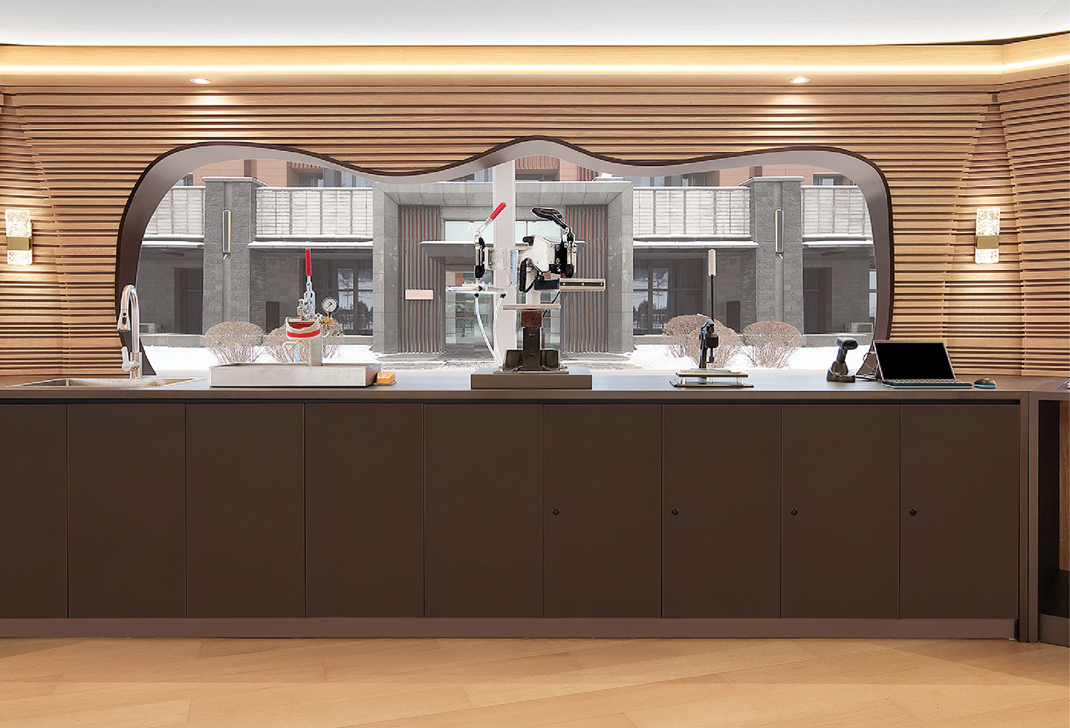 A large counter with a wine bottle on it.