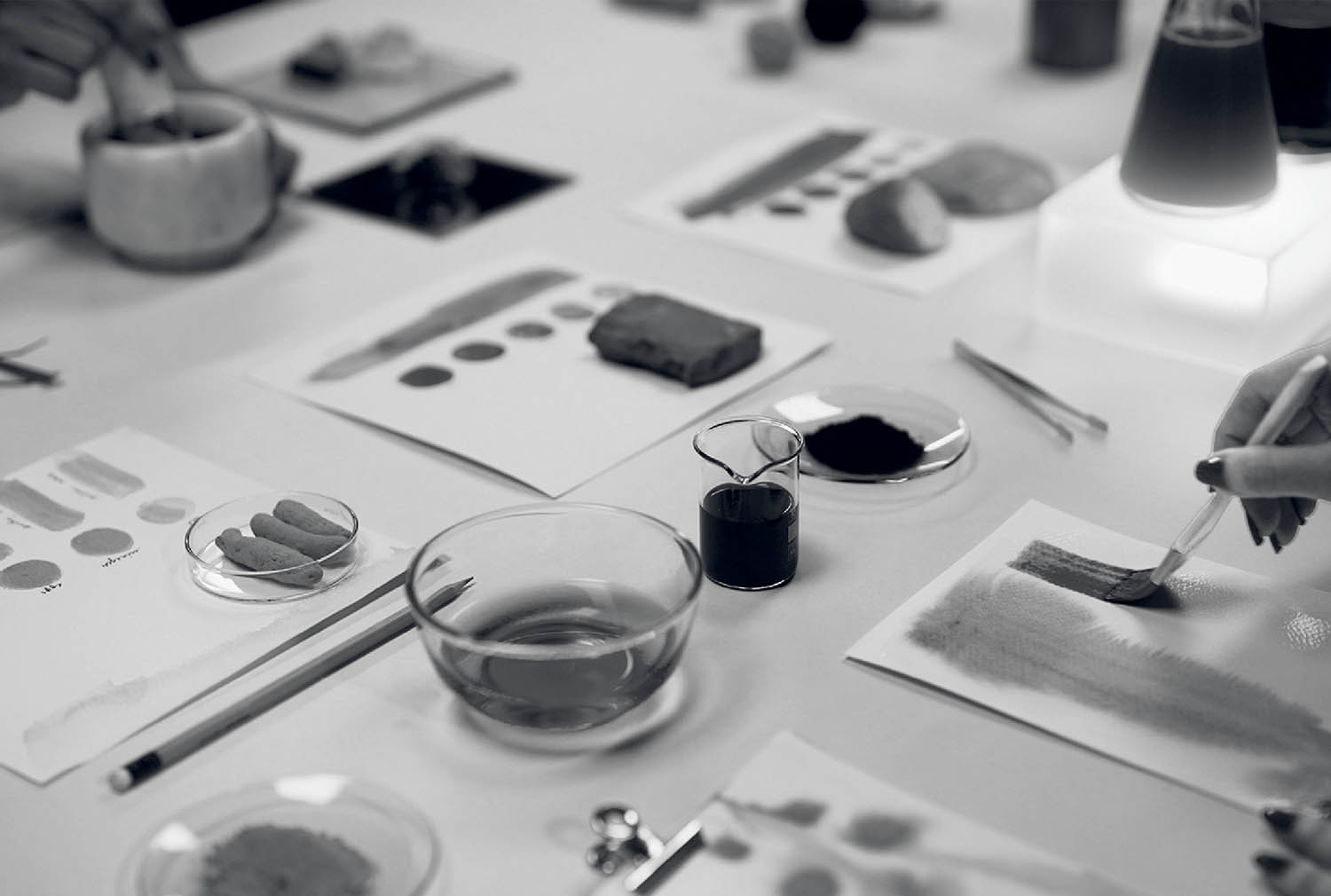 A table with many different types of art.