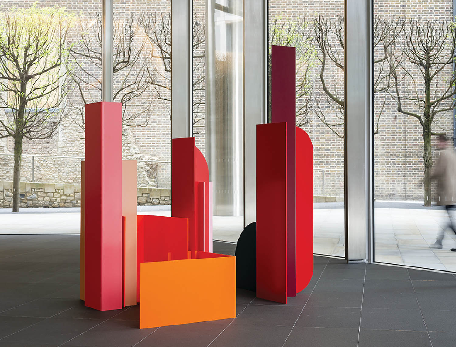 A large red and orange sculpture.