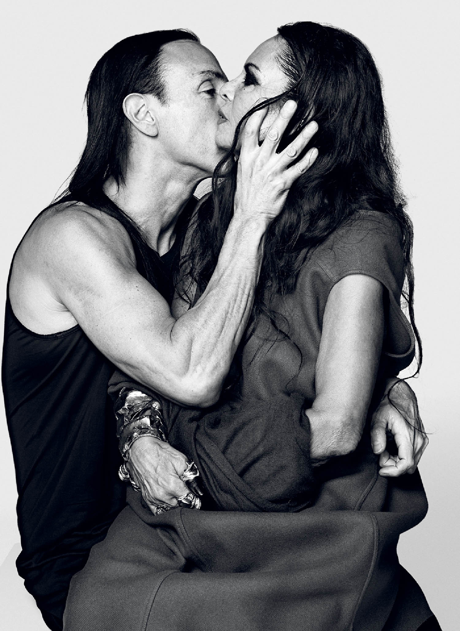 A man and woman kissing each other people.