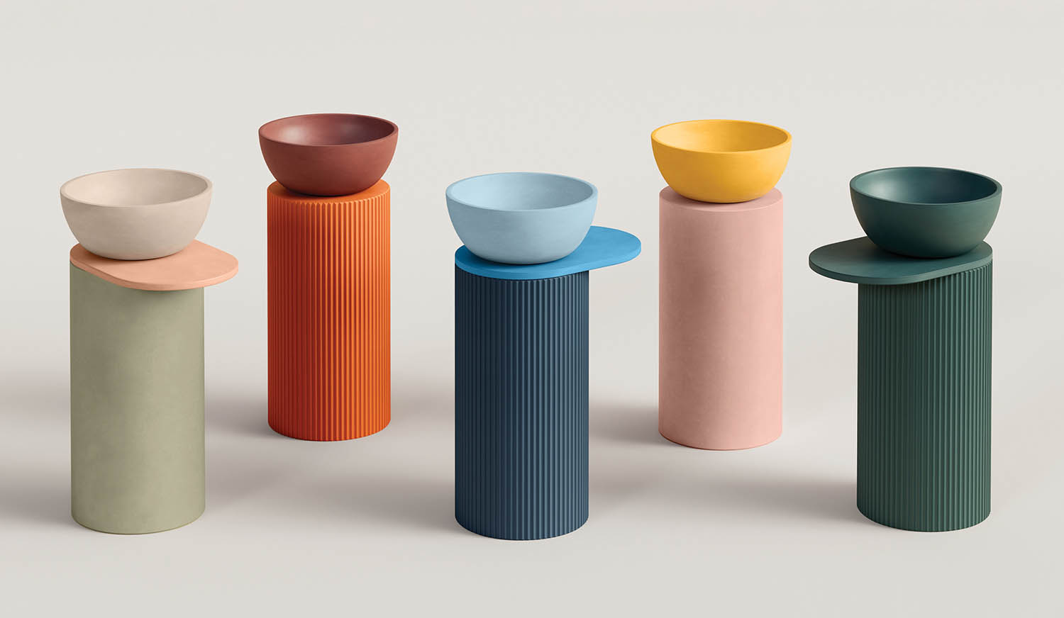 A group of three vases sitting on top of each other vases.
