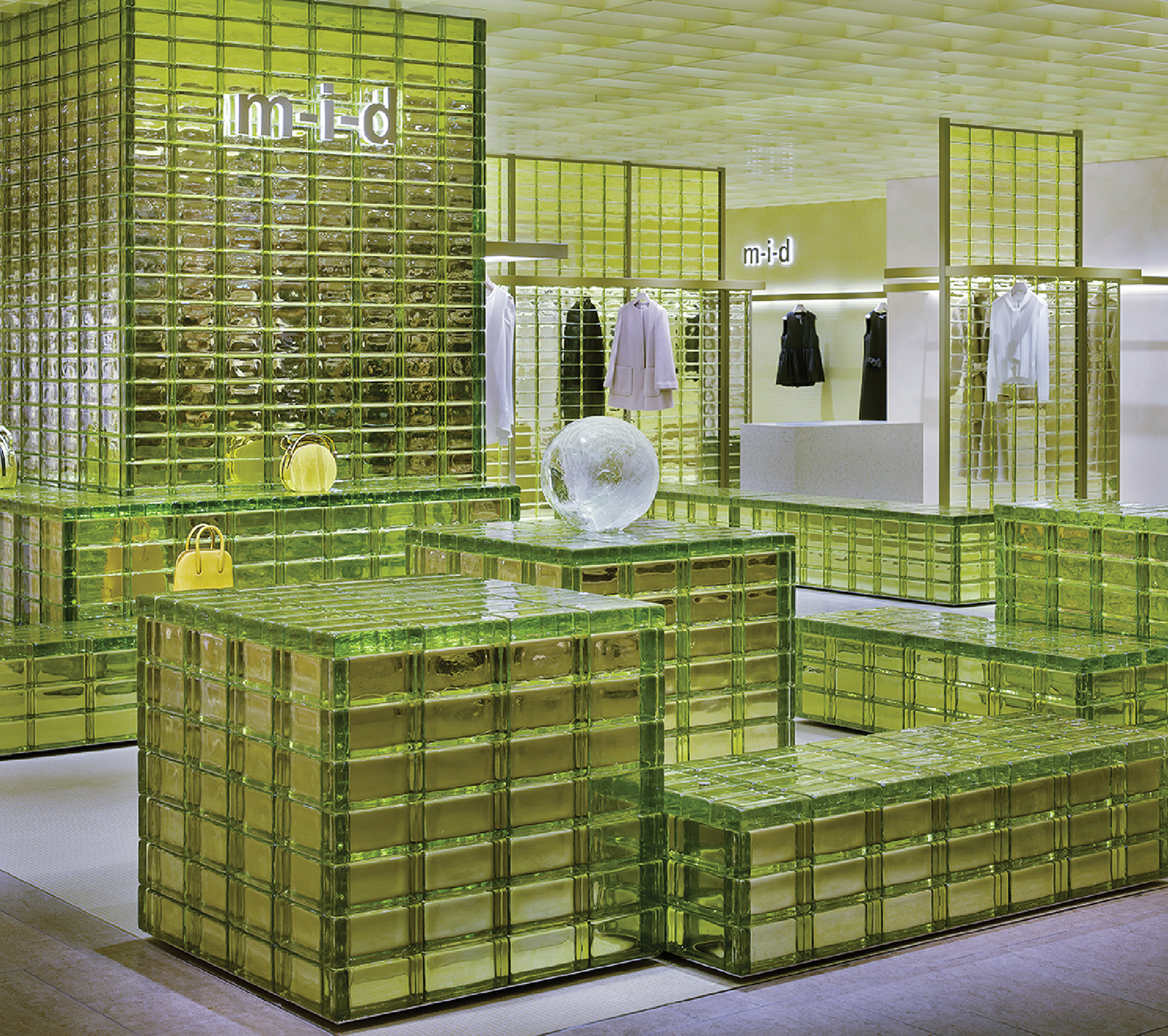 A store with a lot of green glass blocks.