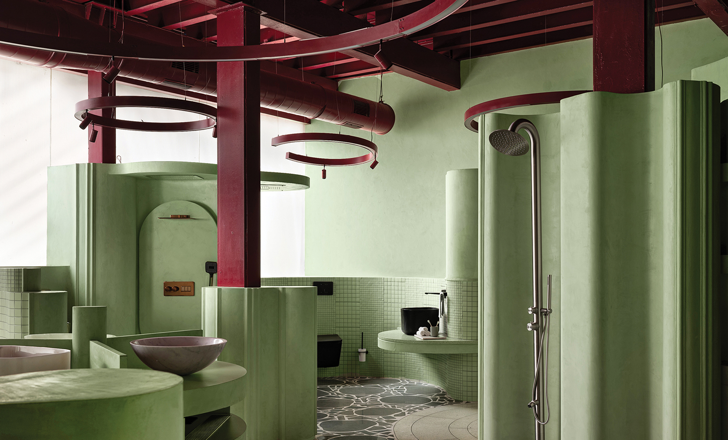 A bathroom with a green wall and a red ceiling.