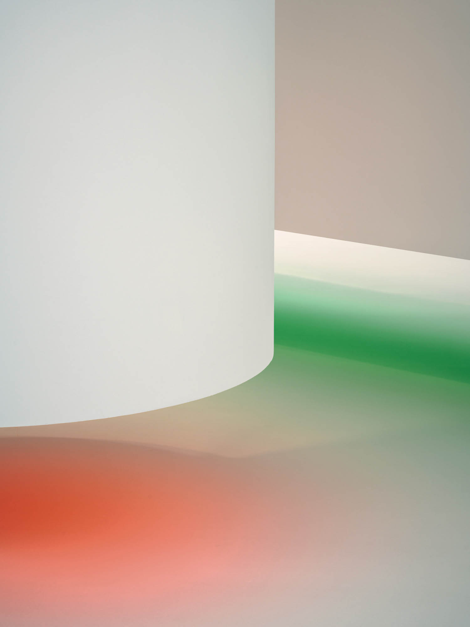 corner of white wall with red and green light below