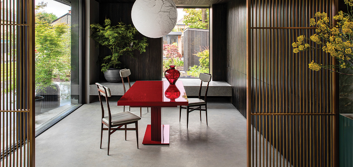 dining area with red table and dividers