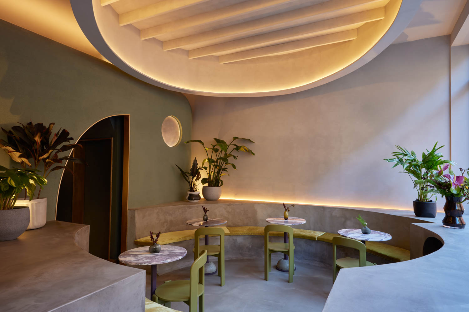 seating area with round benches and light