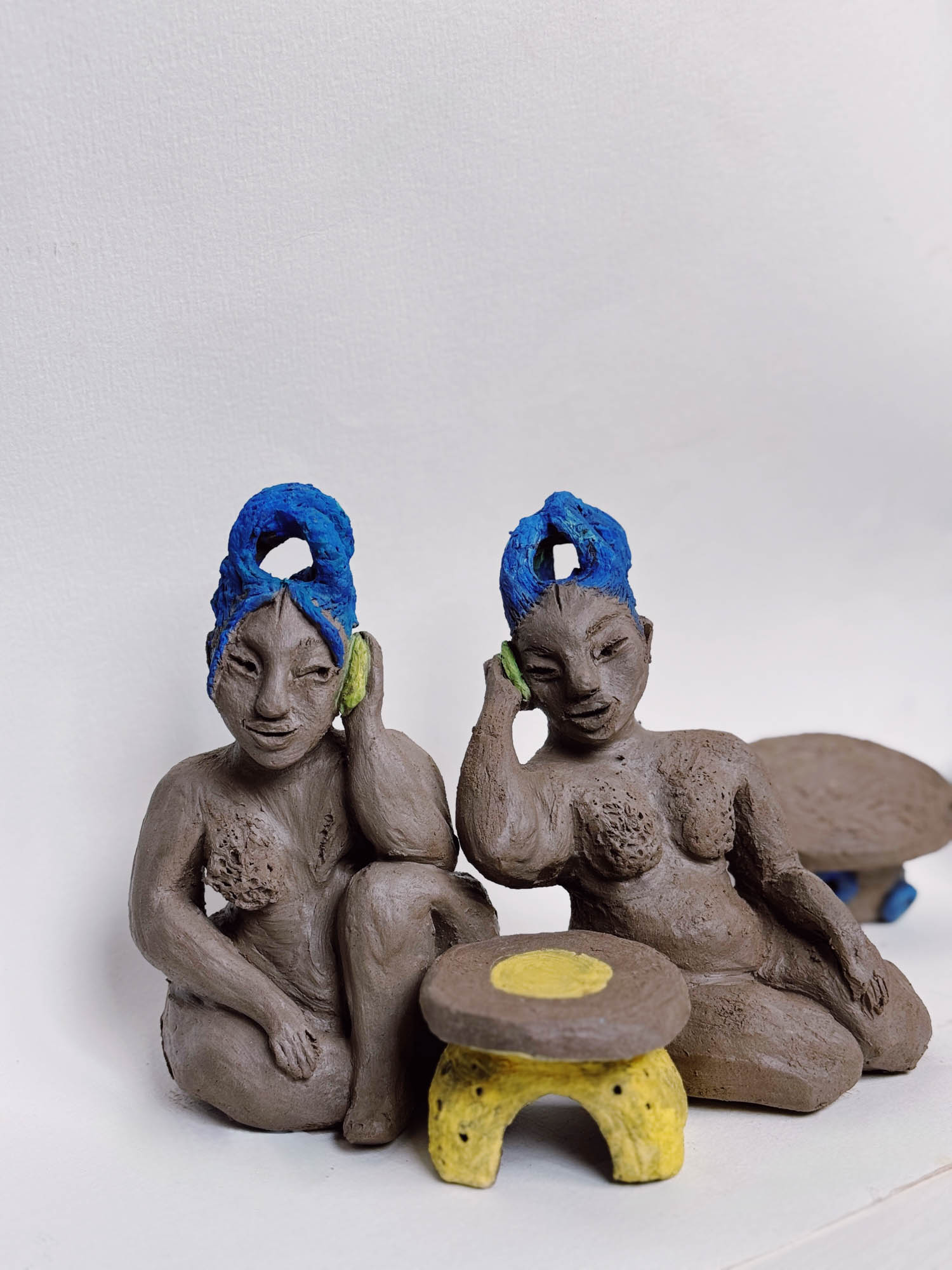two women sitting together