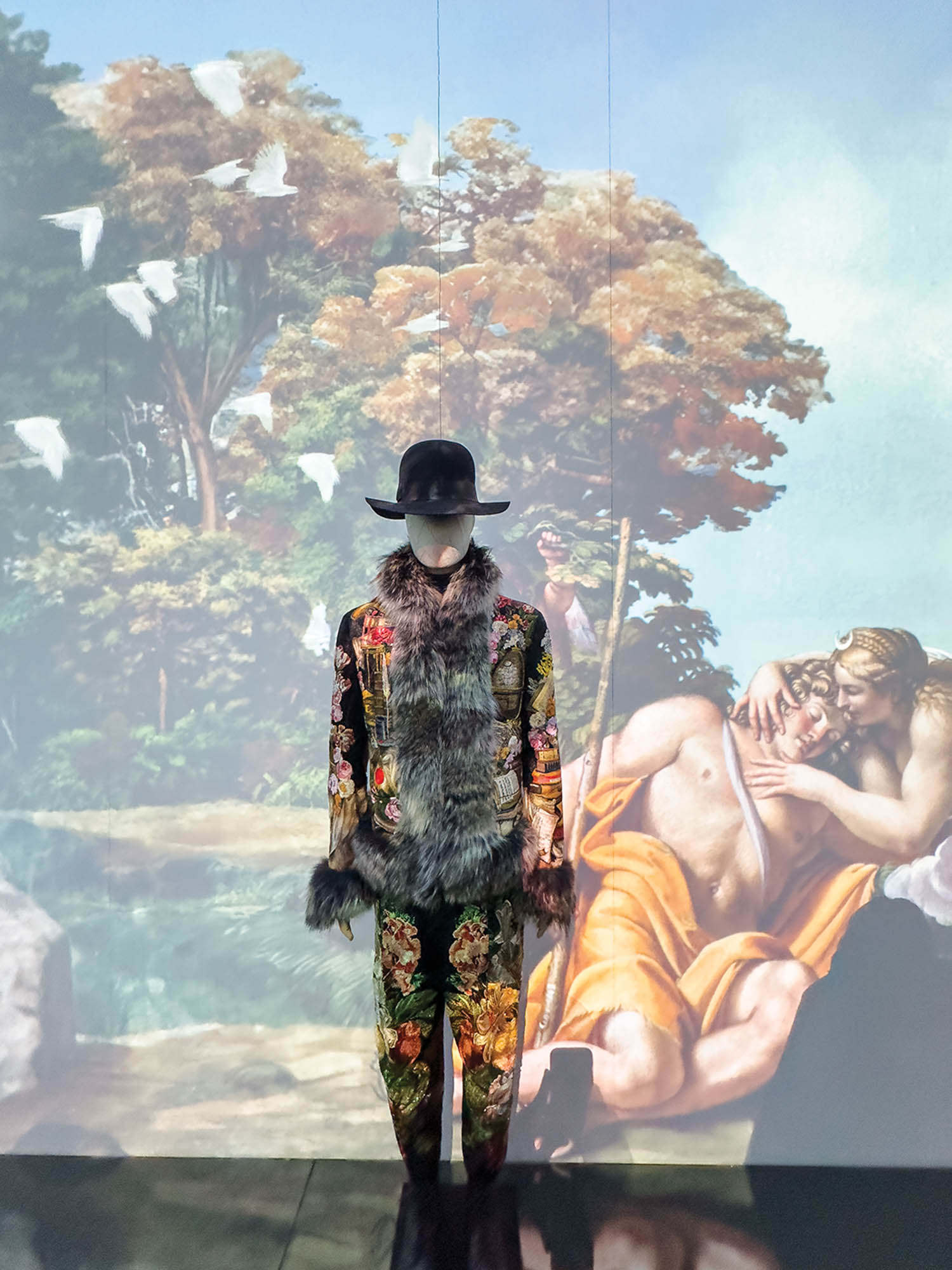 person standing in front of projection