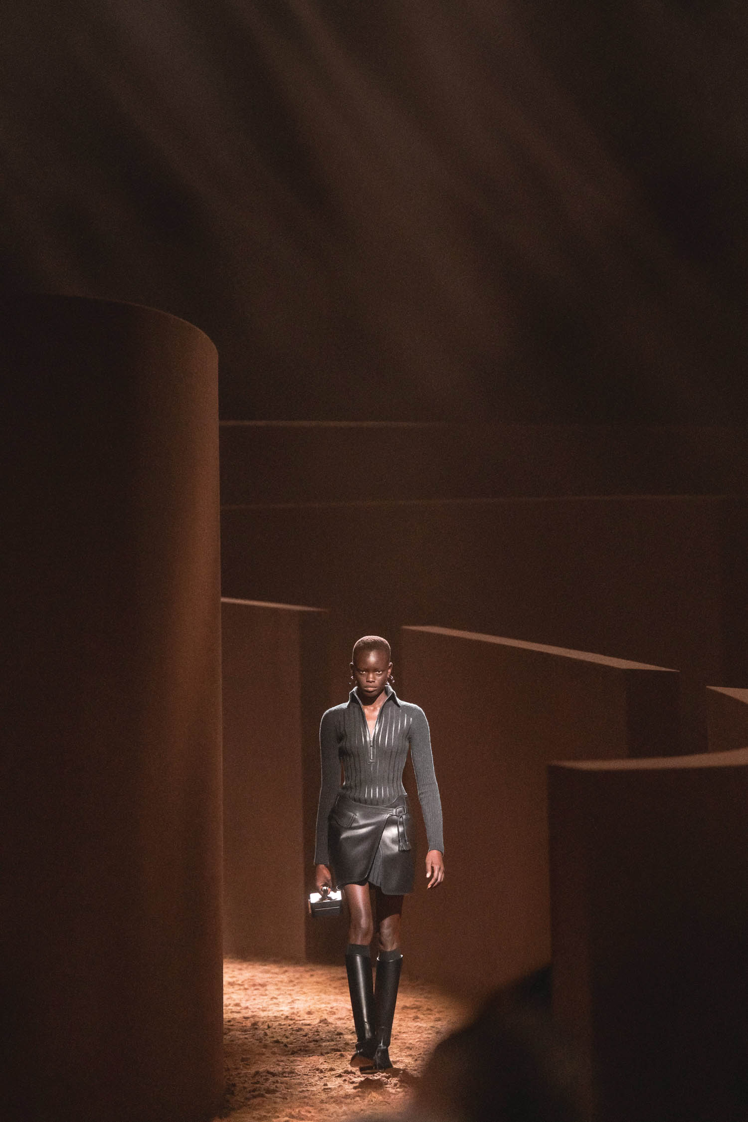 woman walking on runway