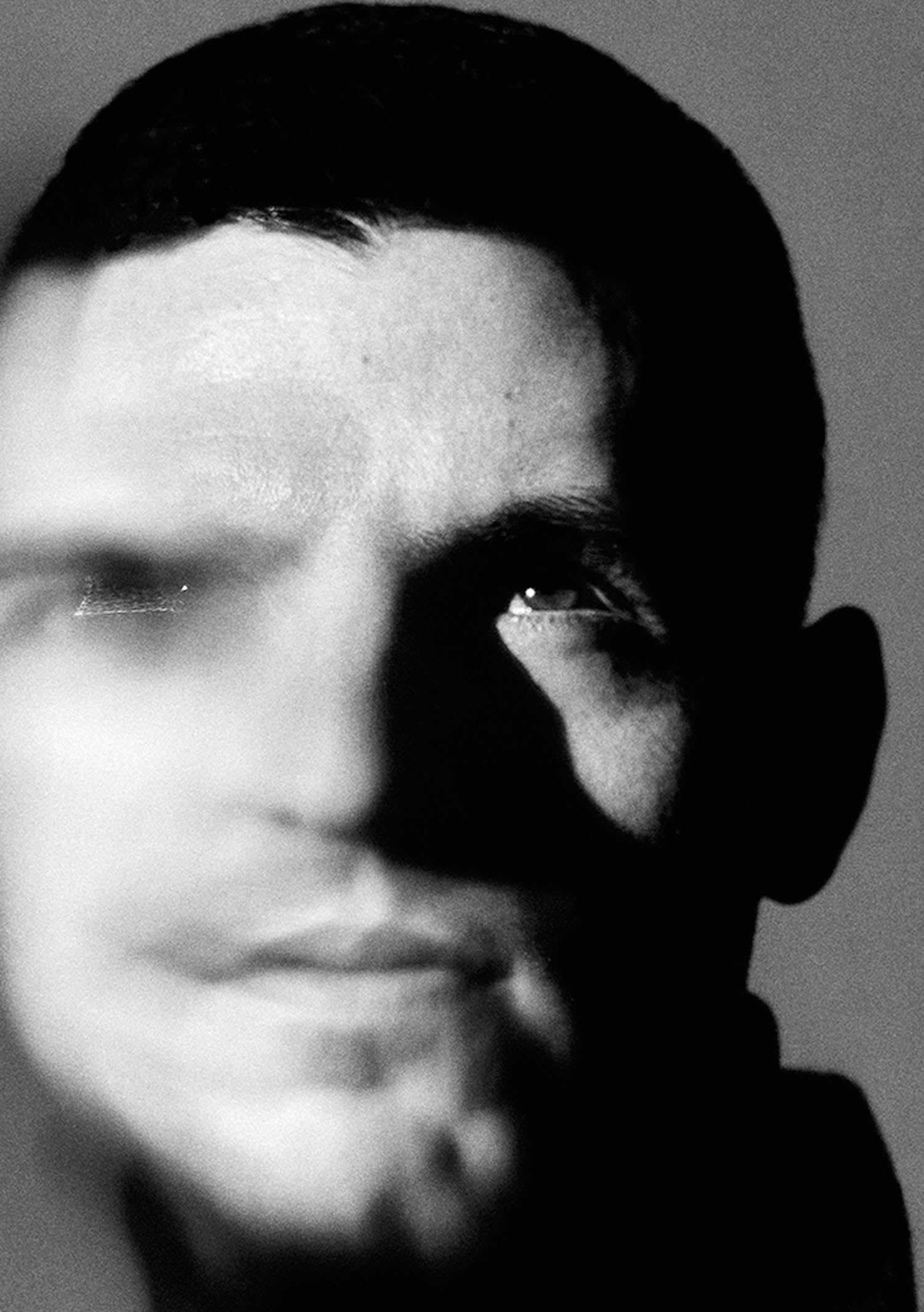 blurred out face of man