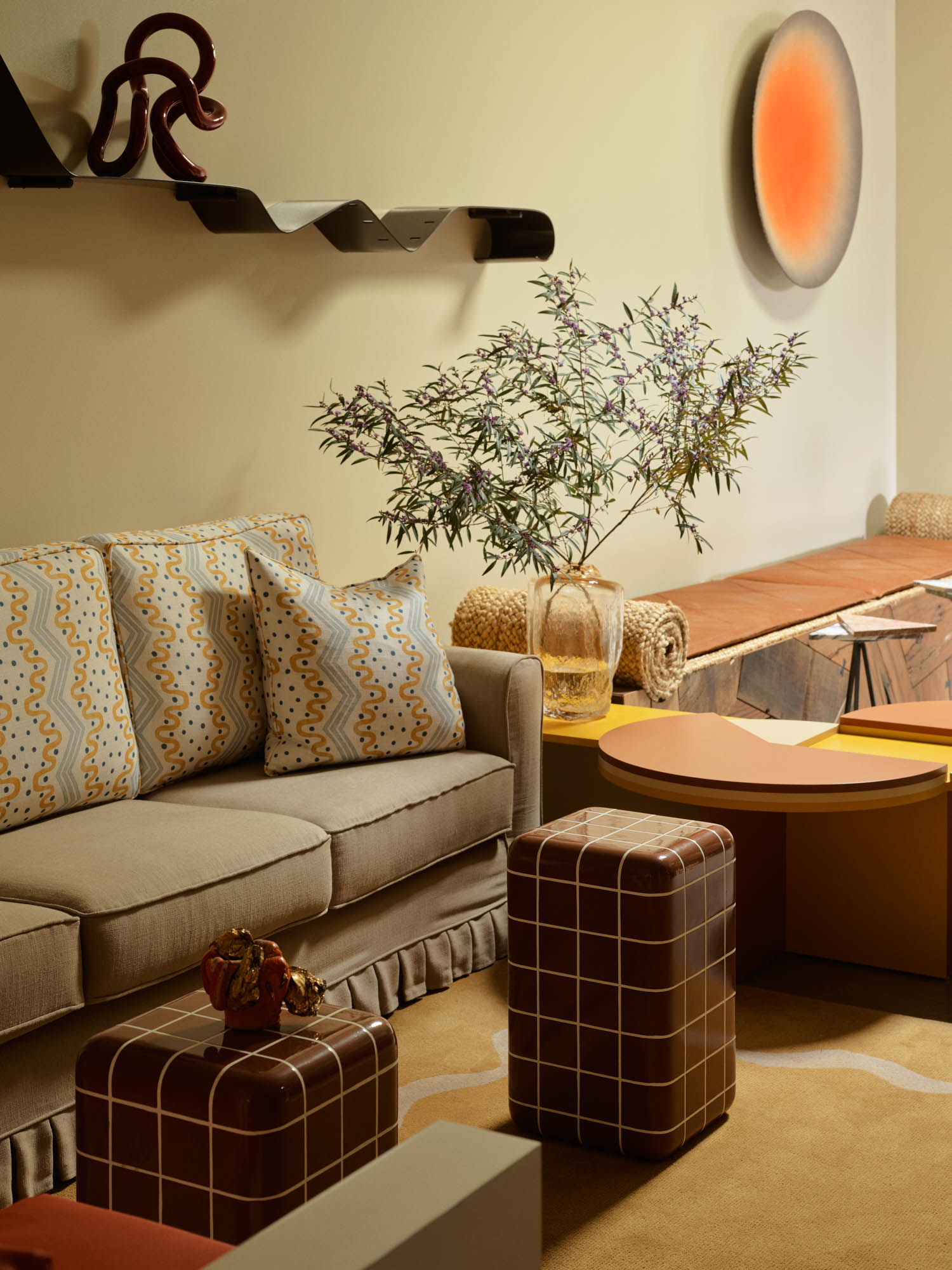 lounge area with sofa, plant and lots of funky furnishings