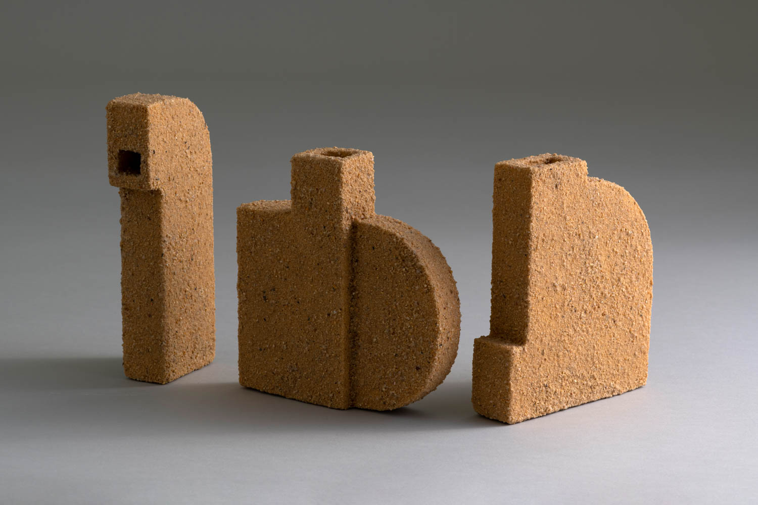 dark brown vases made of cork