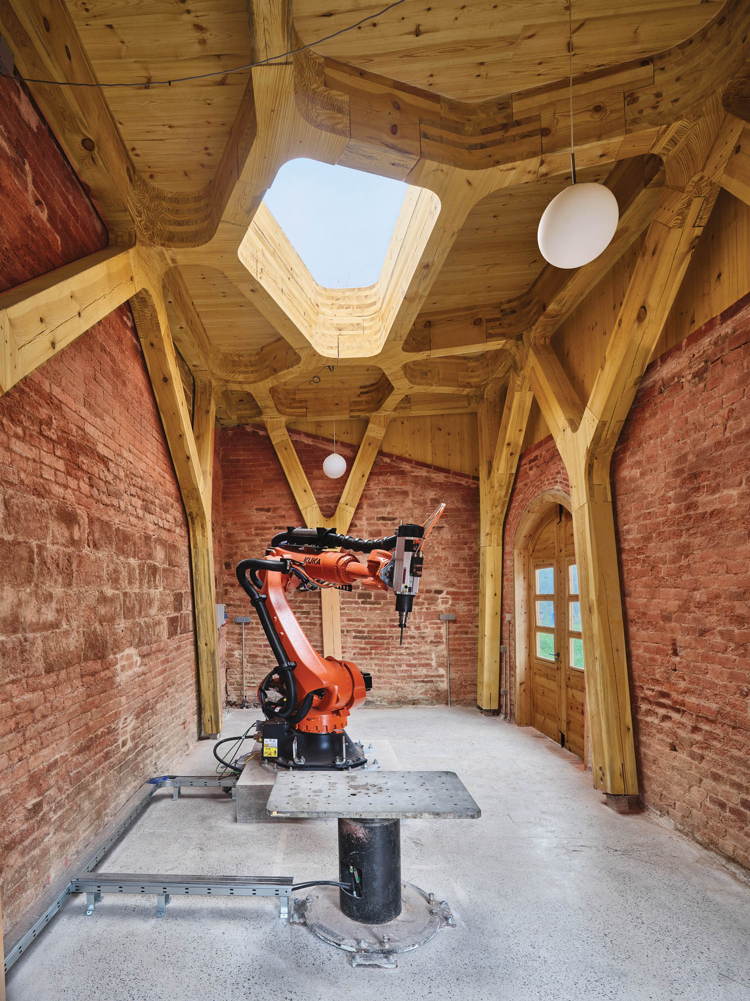 interior of center with brick wall and drilling machine