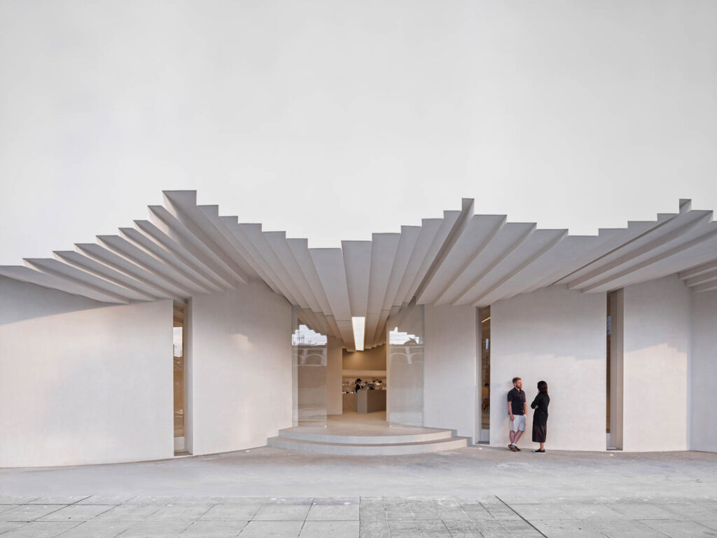 exterior of building with zig-zag canopy