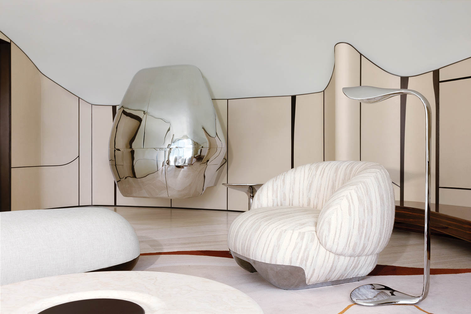 room with striped beach chair, lamp and mirror