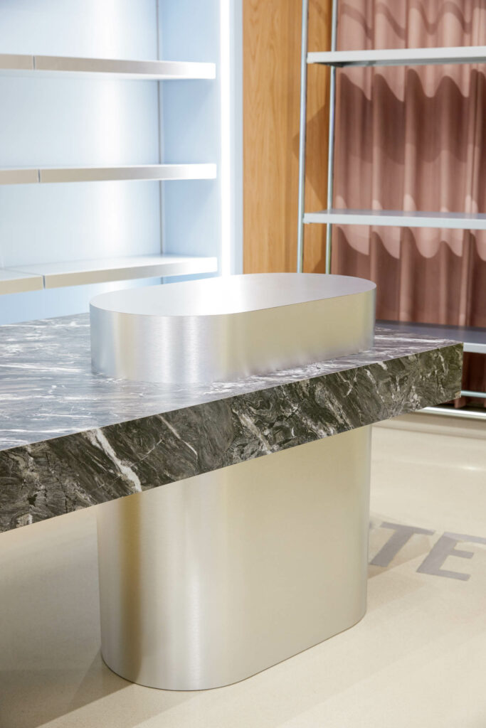 closeup of display table with black marble top