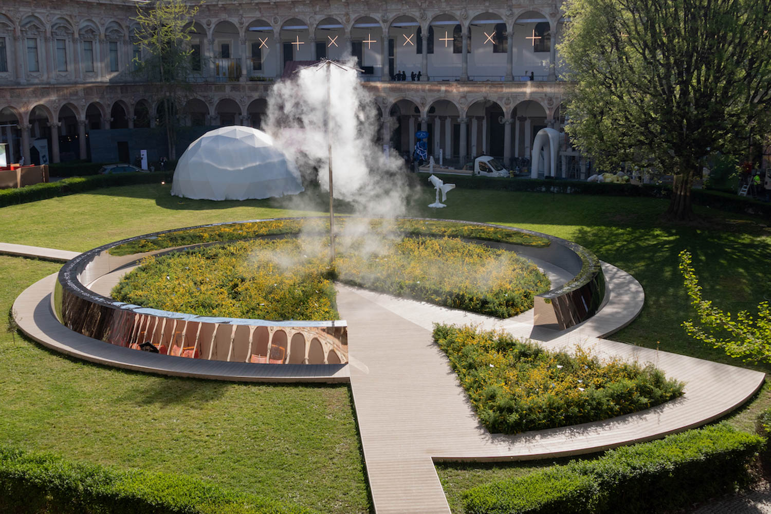 garden with multiple flowers inside a ring