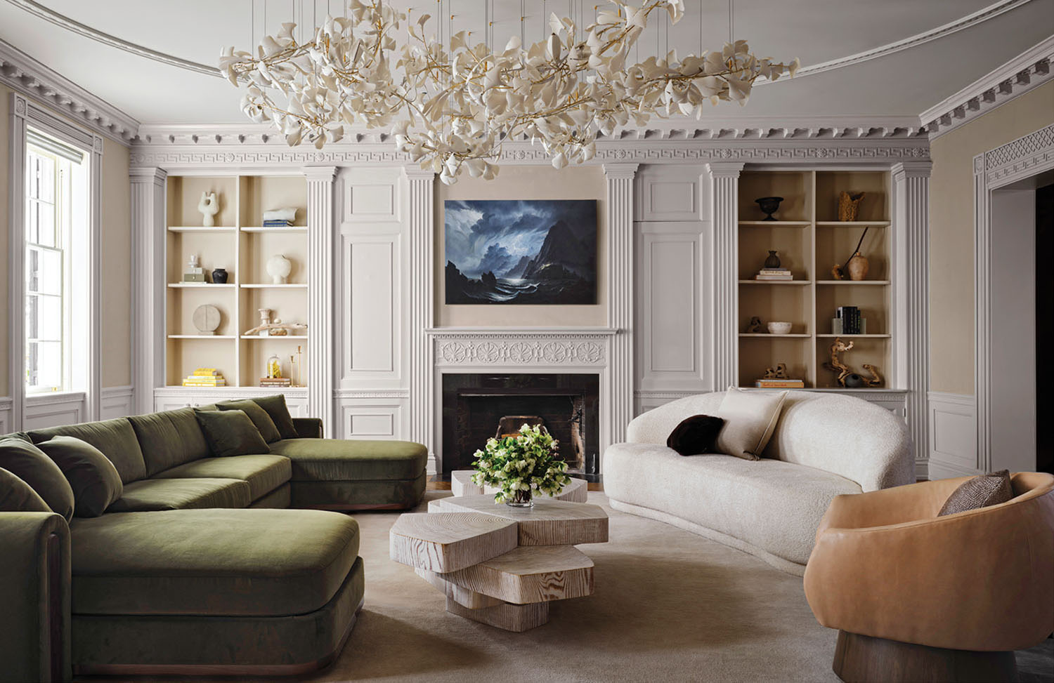 A living room with a fireplace and a couch.