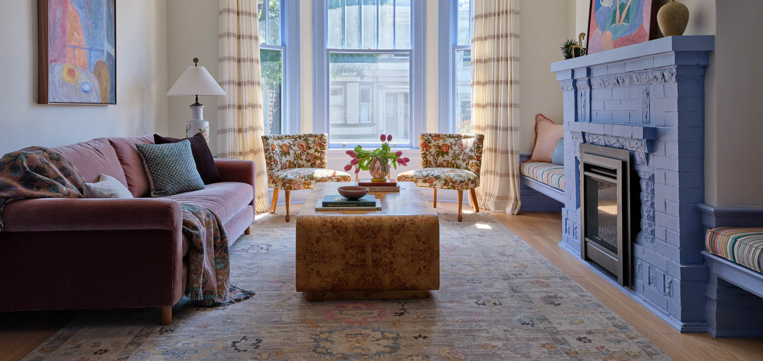 living room with periwinkle blue fireplace