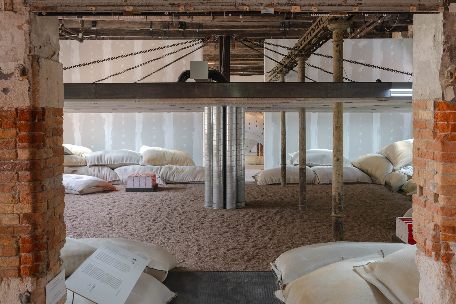 a room full of floor pillows